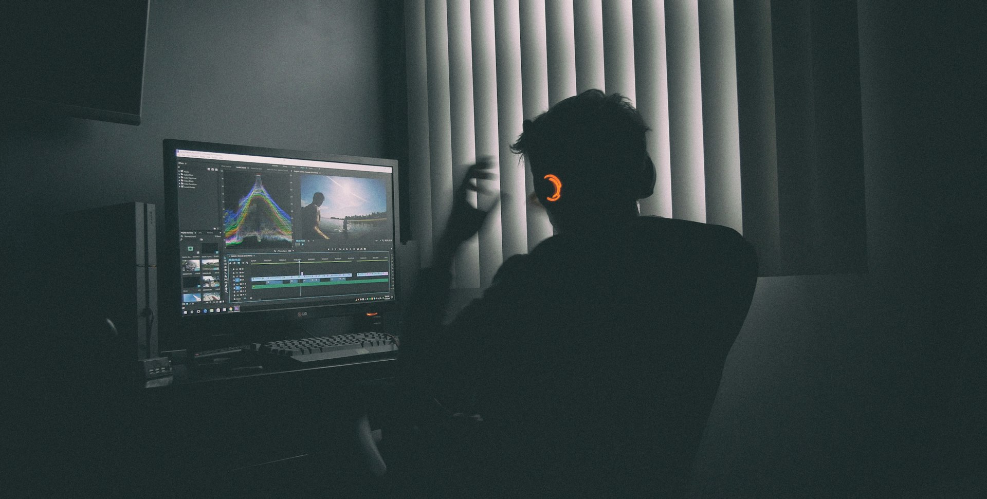 Editor working on a film at night